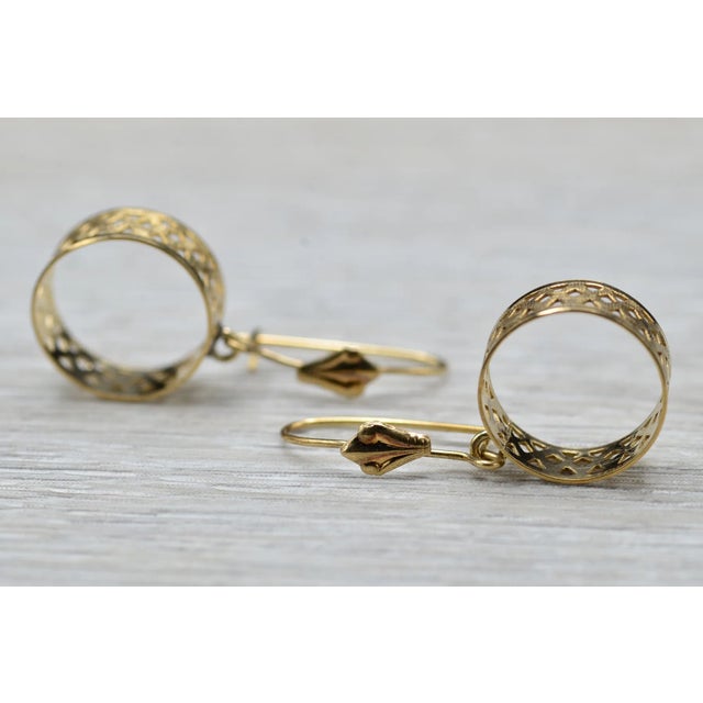 The Shandons: Ladies Delicate 14K Gold Dangler Earrings. Crafted in 14 karat yellow gold, these lightweight dangler...