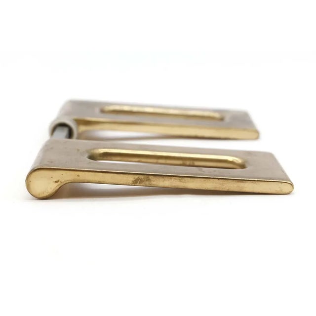 These Italian modern rectangular lever handles are made from solid yellow brass. The sleek and minimalist design of the...