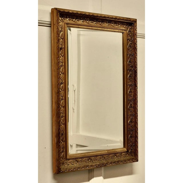 Beautiful 19th Century Gilt Wall Mirror. This is a lovely old mirror it is set in a Decorative Gilt 3” wide Frame. The...