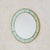 A 1960s Italian wall mirror attributed to Cristal Arte. The circular form is framed in alternating panels of etched pale...