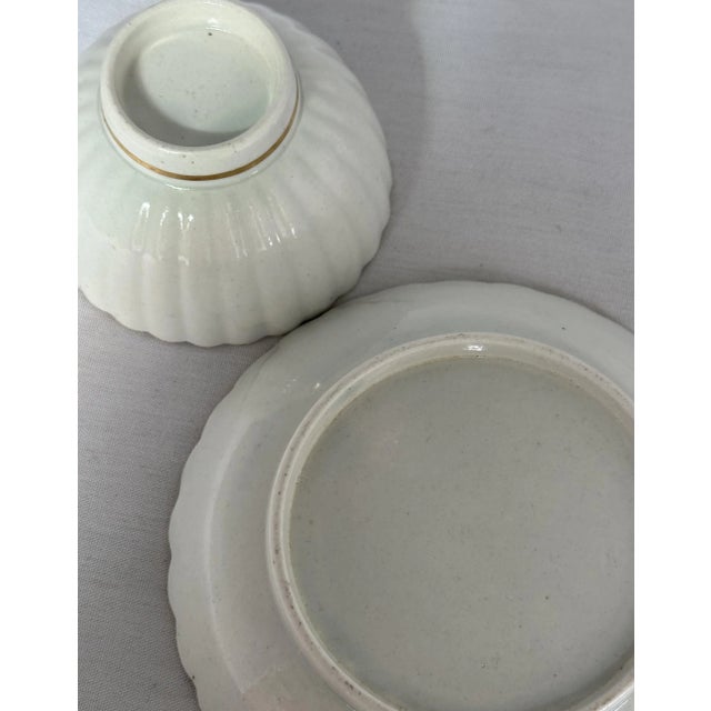 This unmarked English porcelain tea bowl and saucer was made in the late 1700, probably Caughley/Salopian, or Worcester....