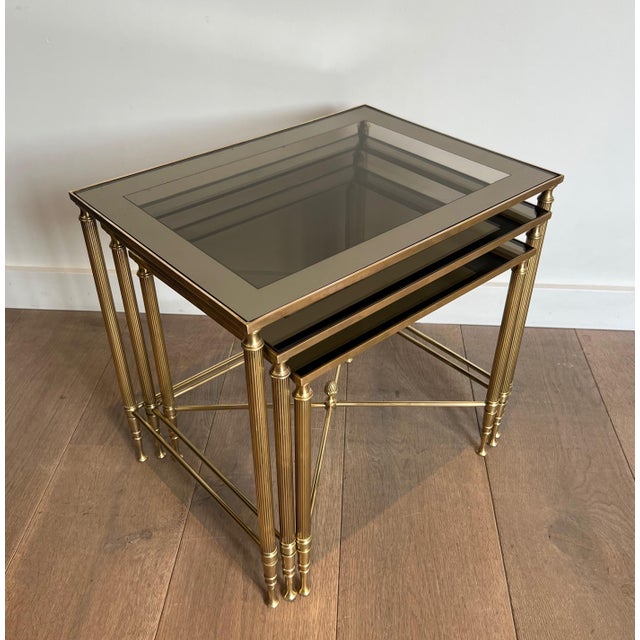 Neoclassical 1940s Neoclassical style brass nesting tables. French work by Maison Jansen. For Sale - Image 3 of 12