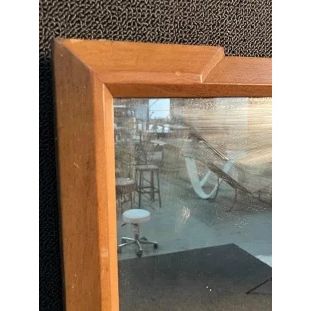Unique beveled maple mirror in a mid century modern style. Condition: appropriate for age and use slight chipping...