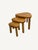 A set of three nesting tables in a warm color solid oak, oval/kidney shaped in the style of Pierre Chapo,ca 1970. Useful,...