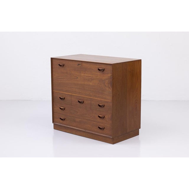 Danish Modern teak secretary cabinet by Peter Hvidt and Orla Mølgaard-Nielsen. Manufactured by Søborg Møbelfabrik in...