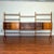 Spectacular freestanding teak three-bay wall unit or room divider with three cabinets and eight shelves, designed by Erik...