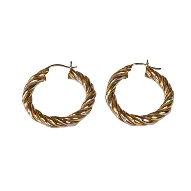Vintage 14K White and Yellow Gold Twisted rope Hoop Earrings. Earrings feature an elegant twisted rope motif that...