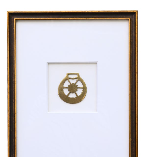 The Framed Antique Horse Bridle Medallion, originating from France, is a stunning piece of equestrian heritage beautifully...