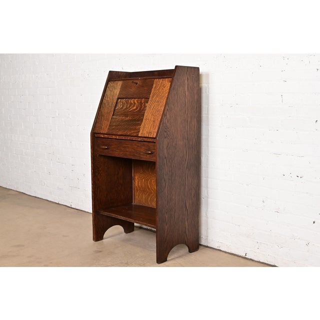 A rare and exceptional antique Mission or Arts & Crafts period quarter sawn oak drop front secretary desk By Gustav...
