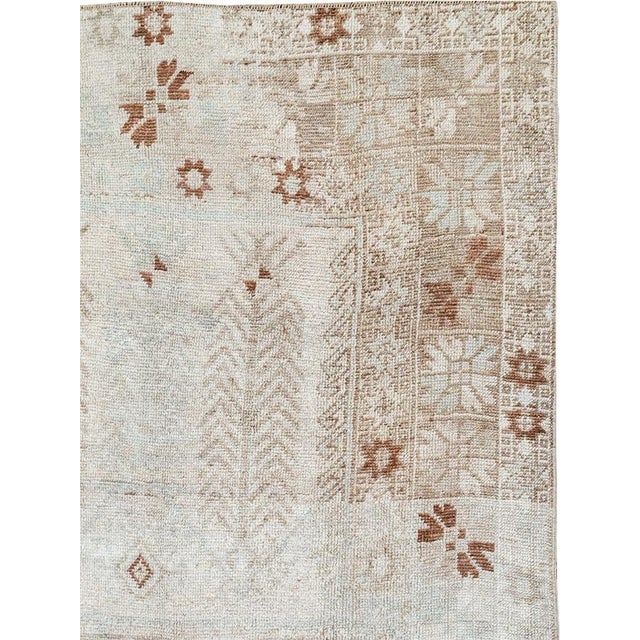 This mid-20th-century Turkish Anatolian wide gallery runner presents an airy, softly articulated composition across an...