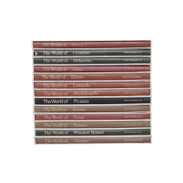 A set of thirteen hardcover, boxed art books. The set includes The World of Picasso, Cezanne, Winslow Homer, Delacroix,...