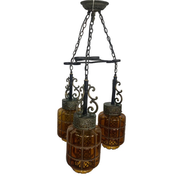 Mid Century Spanish Gothic 3 Pendant Amber Swag Chandelier For Sale