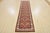 This traditional tribal geometric Caucasian Kazak runner is hand-knotted with an all-wool pile on a cotton foundation....