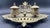 Features double ink containers with lids. (No interior liners are present) Made of cast metal, most likely brass. (Metal...