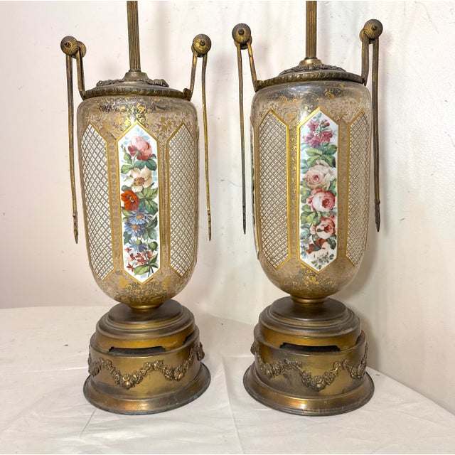 Up for sale is an exquisite pair of large antique bronze mounted cut to clear glass table lamps by Moser. These elegant...