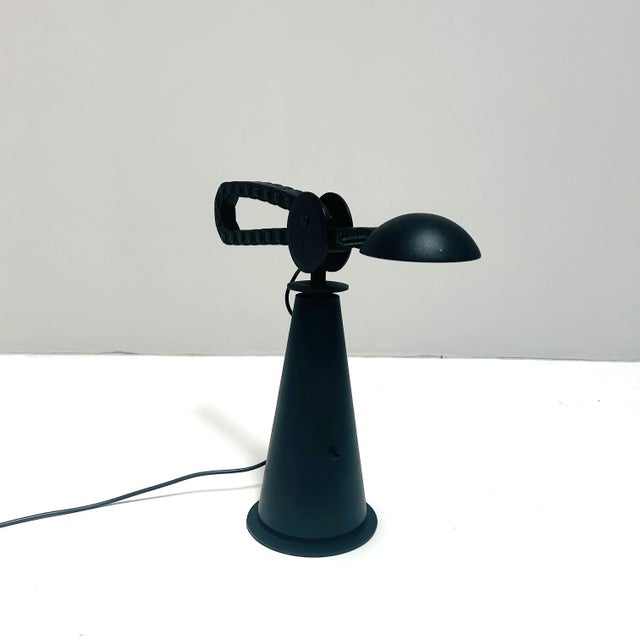 Italian postmodern lamp by studio p.e.r for egoluce. Iconic adjustable mechanism which not only looks great, which is also...