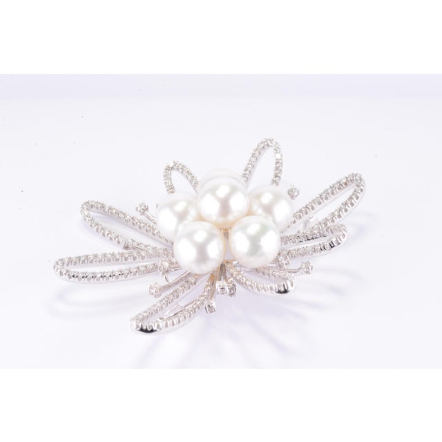 Beautiful antique natural pearl and diamond brooch. Natural diamonds are a total of 4.25 CT, F-G color VS2-VS1 clarity....