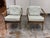 Design Plus Gallery presents a Pair of Club Chairs by McGuire Furniture from the 1970's. The chairs have hand-shaped...