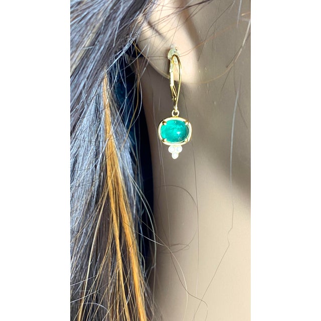 A Timeless Union of Color, Craftsmanship, and Elegance Immerse yourself in the rich hues and refined glamour of these 14K...