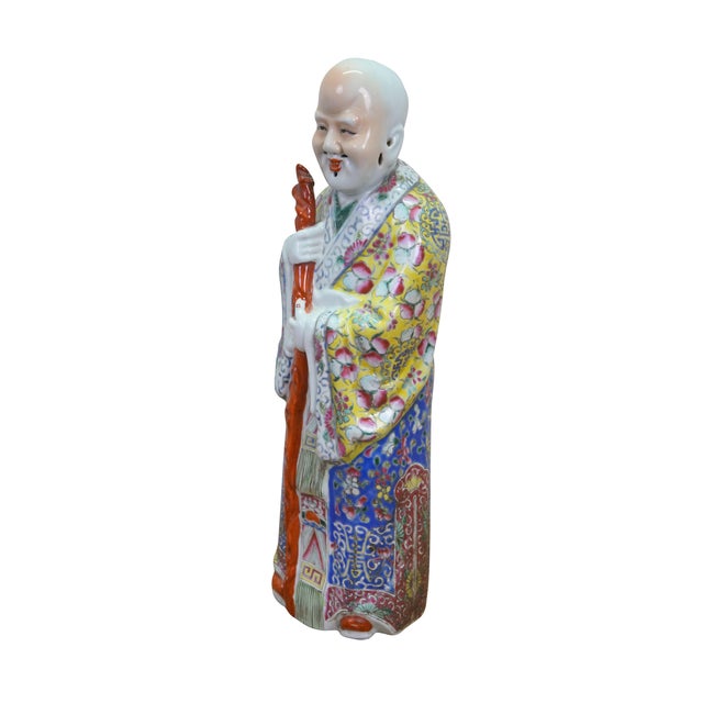 Large antique Chinese porcelain incense burner figurine depicting Shouxing, the deity of longevity, distinguished by his...