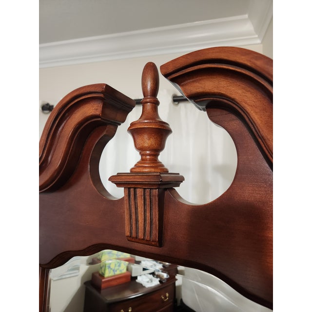 Classic cheval mirror, a full-length dressing mirror suspended in a frame that allows it to tilt. This specific piece...