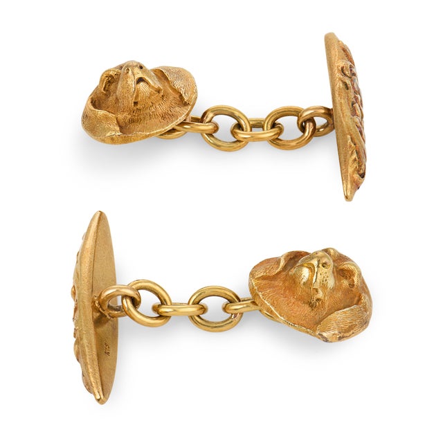 These charming Victorian dog cufflinks are a delightful antique pair from the 1900’s, crafted in rich 18k yellow gold. The...