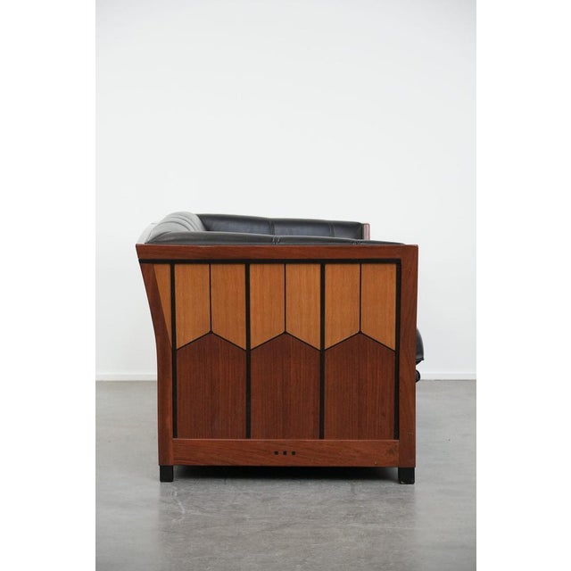 Impressive Art Deco Schuitema black leather 2.5-seater designer sofa from the Decoforma series with beautiful woodwork. :...