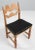 A striking dining chair by Henning Kjærnulf, made of oak and ready for you to upholster Refreshing design with bold...