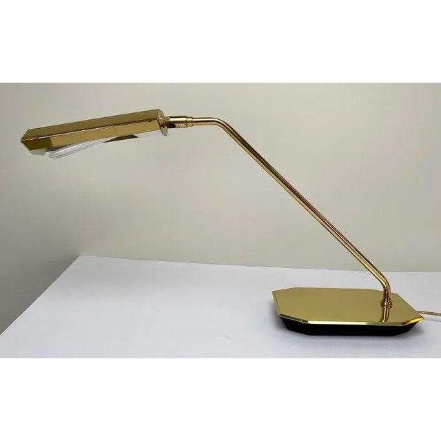 A pair of rare Mid-Century Modern treasures Koch & Lowy adjustable Pharmacy Brass Desk Lamps. Each lamp bears the...