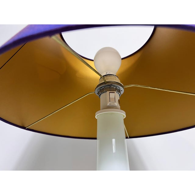 This stunning table lamp from 1970s Sweden captures the elegance of mid-century design with a touch of Space Age flair....