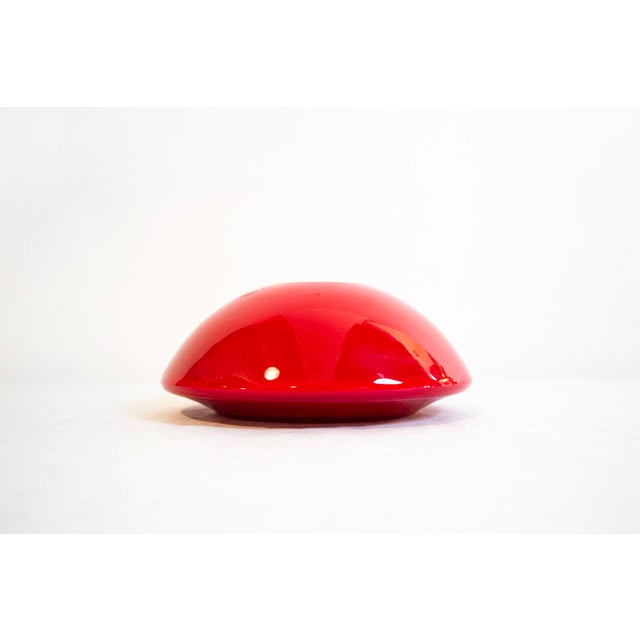 Red blown glass vase with a white interior. Designer Walter Gropius Manufacturer Rosenthal Studio Line Year 1969 This...