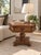 Ethan Allen solid maple pedestal table with a handy drawer.