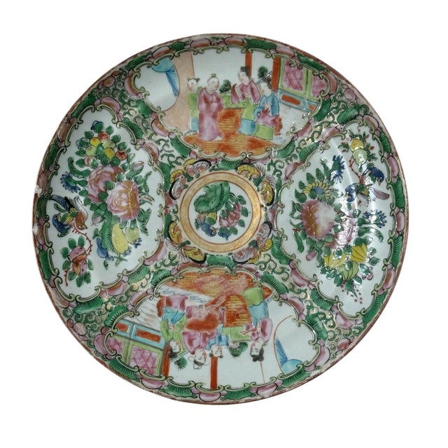 A finely decorated Chinese Export Rose Medallion porcelain plate dating to the Qing Dynasty, circa 1875. Hand painted in...