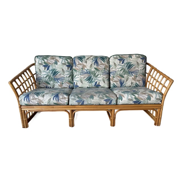 Vintage Ficks Reed Style Bamboo Rattan Sofa With Floral Print Upholstery/ Sold For Sale