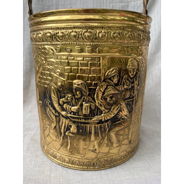 Vintage Repoussé brass fireplace bucket firewood kindling log holder. Moveable top handle. Nice condition, a few small...
