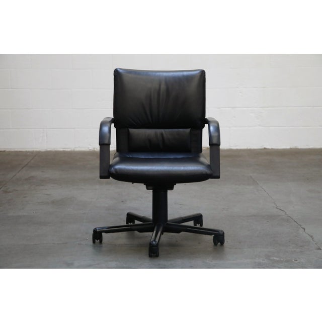 A spectacular set of Mario Bellini signed desk chairs for the Vitra, dated 1992 production. This Post Modern set of task...