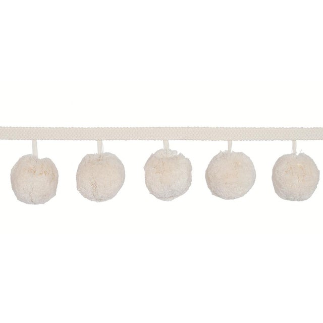 Pom Pom Trim is a fun oversize ball fringe that adds a wonderful whimsical element wherever it goes. Featuring plush...