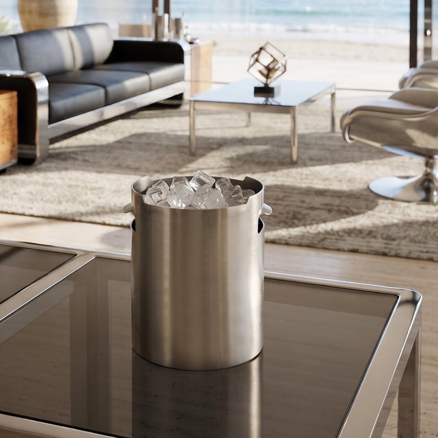 1970s modernist ice bucket was designed by the visionary Italian architect and designer Gio Ponti for the esteemed...