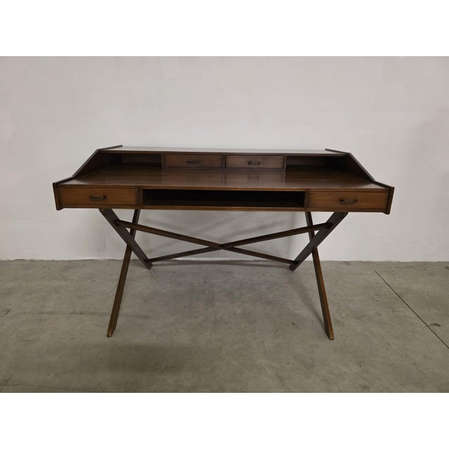 Desk by Gianfranco Frattini for Cantieri Carugati Extremely rare desk from the late 1950s. Made of walnut veneer. Designed...