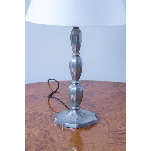 Art Deco table lamp designed and made in Sweden during the 1920s. Cast in solid pewter with details and lamp fitting in...