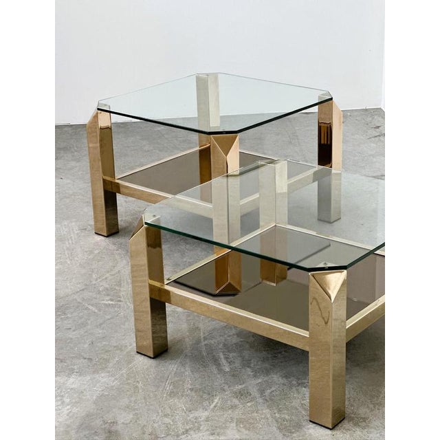 A striking set of two vintage coffee tables by belgo chrom, belgium, dating from the 1970s. These architectural tables...