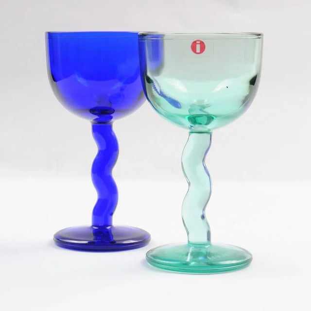 - Pair of wine glasses named Mesulassi - Designed by Markku Salo for Iittala around 1993 - This pattern was only available...