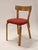 Artek 69 chair, birch with red upholstery. The chair is from around 1940-1950. Old Artek stamp on the base. Gorgeous...