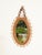 Wonderful and incredibly stylish Mid-Century organic oval mirror with an adjustable or removable chain, entirely made of...