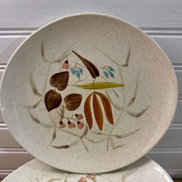 Add a beautiful touch of organic mid-century modern design to your table with this vintage set of six lunch/salad plates...