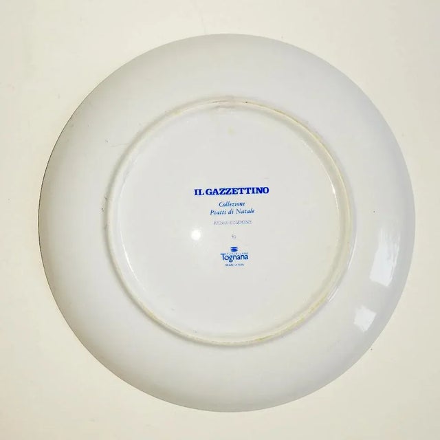 This ceramic plate was designed by Guttuso for the Gazzettino series from Tognana Ceramics. It was made in Italy.