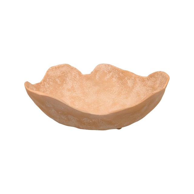 Its gently undulating rim creates a fluid, petal-like silhouette, while the warm terracotta finish with a lightly...