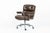 This brown leather Model 3475 Eames Time Life Executive Lobby Chair designed by Charles & Ray Eames for Herman Miller was...
