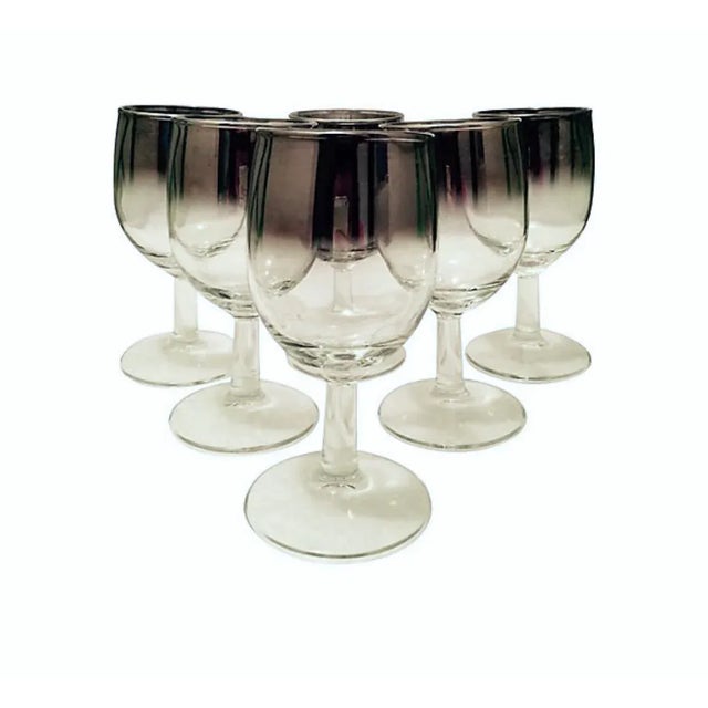 Set of six Dorothy Thorpe-style goblets with carrier. Goblets, 2.5"Dia x 5"H. Wear consistent with age and use.