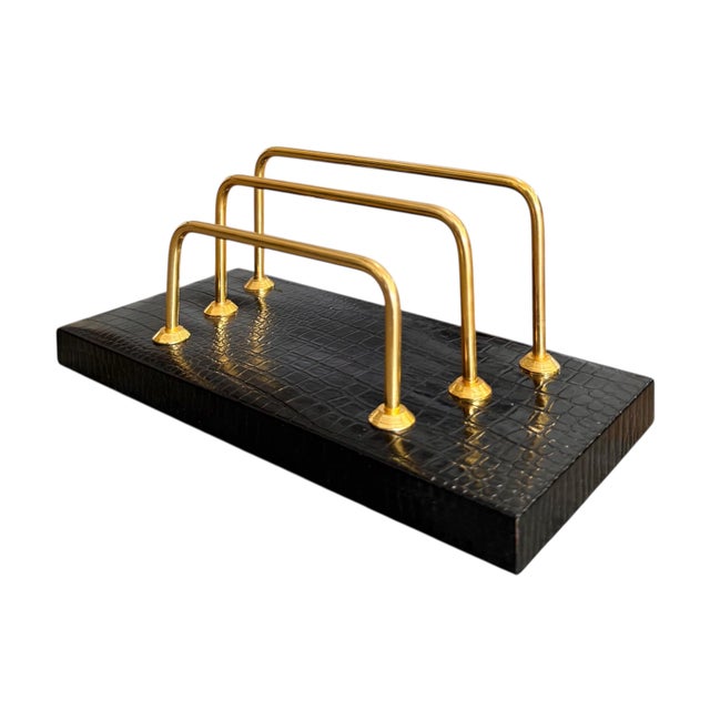 A sophisticated desk set made in Italy for Saks Fifth Avenue; circa 1980s. Rich black leather embossed with crocodile...